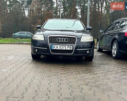 Черный Ауди А6, объемом двигателя 2.4 л и пробегом 305 тыс. км за 7000 $, фото 1 на Automoto.ua