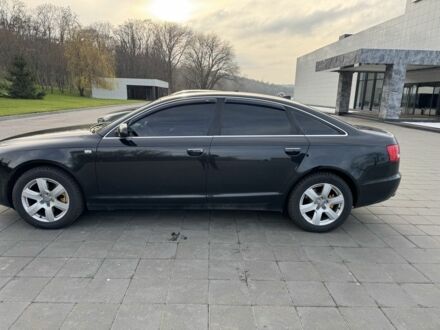 Чорний Ауді А6, об'ємом двигуна 2.4 л та пробігом 261 тис. км за 9500 $, фото 1 на Automoto.ua