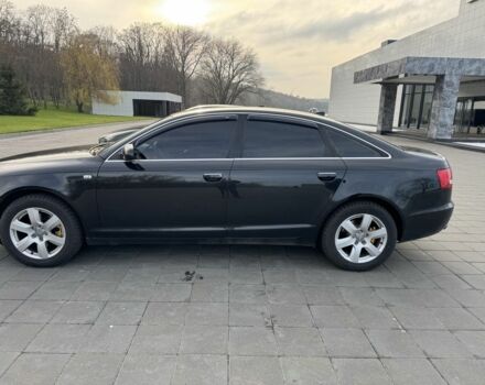 Черный Ауди А6, объемом двигателя 2.4 л и пробегом 261 тыс. км за 9500 $, фото 1 на Automoto.ua