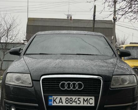 Черный Ауди А6, объемом двигателя 2.4 л и пробегом 300 тыс. км за 7000 $, фото 1 на Automoto.ua