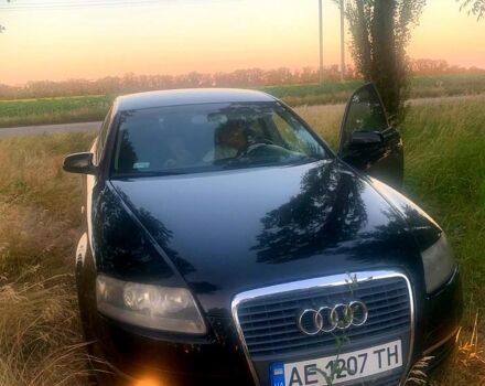 Черный Ауди А6, объемом двигателя 2.4 л и пробегом 400 тыс. км за 7000 $, фото 1 на Automoto.ua