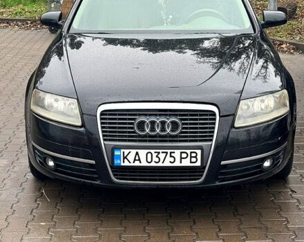 Черный Ауди А6, объемом двигателя 2.4 л и пробегом 305 тыс. км за 7000 $, фото 1 на Automoto.ua
