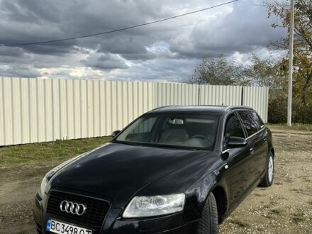 Черный Ауди А6, объемом двигателя 2 л и пробегом 340 тыс. км за 6700 $, фото 1 на Automoto.ua