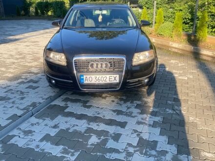 Черный Ауди А6, объемом двигателя 2 л и пробегом 310 тыс. км за 6100 $, фото 1 на Automoto.ua