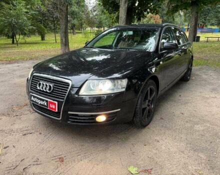 Черный Ауди А6, объемом двигателя 2 л и пробегом 290 тыс. км за 6490 $, фото 1 на Automoto.ua