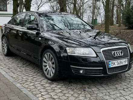 Черный Ауди А6, объемом двигателя 2 л и пробегом 248 тыс. км за 7600 $, фото 1 на Automoto.ua