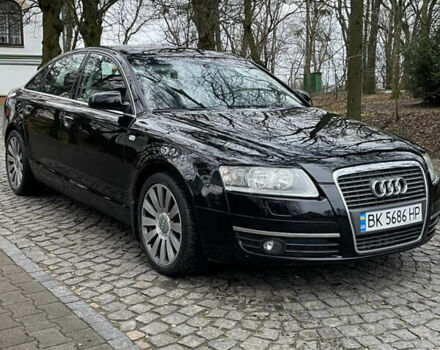 Черный Ауди А6, объемом двигателя 2 л и пробегом 248 тыс. км за 7600 $, фото 1 на Automoto.ua