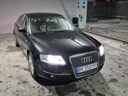 Черный Ауди А6, объемом двигателя 1.98 л и пробегом 243 тыс. км за 7500 $, фото 1 на Automoto.ua
