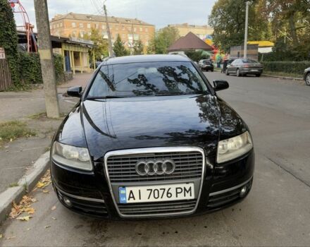 Черный Ауди А6, объемом двигателя 2 л и пробегом 290 тыс. км за 7528 $, фото 1 на Automoto.ua
