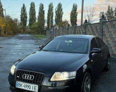 Черный Ауди А6, объемом двигателя 2 л и пробегом 247 тыс. км за 9200 $, фото 1 на Automoto.ua