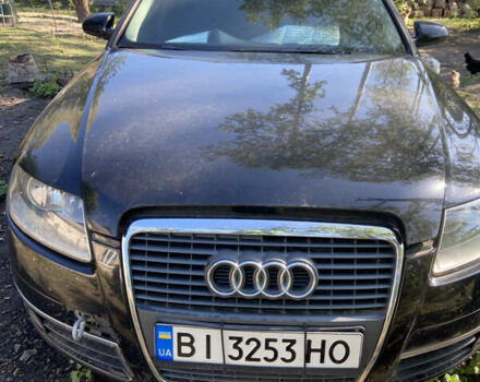 Черный Ауди А6, объемом двигателя 1.97 л и пробегом 300 тыс. км за 6000 $, фото 1 на Automoto.ua