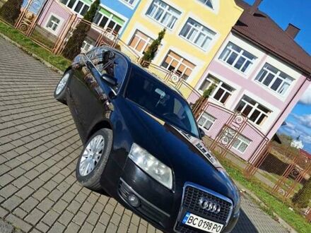 Черный Ауди А6, объемом двигателя 2 л и пробегом 309 тыс. км за 8995 $, фото 1 на Automoto.ua