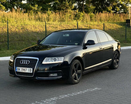 Черный Ауди А6, объемом двигателя 2 л и пробегом 430 тыс. км за 9650 $, фото 1 на Automoto.ua