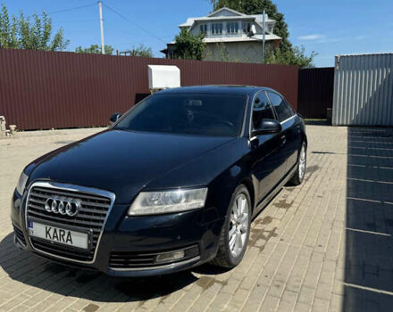 Черный Ауди А6, объемом двигателя 2 л и пробегом 296 тыс. км за 7500 $, фото 1 на Automoto.ua