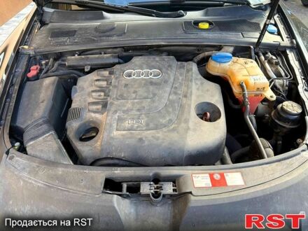 Чорний Ауді А6, об'ємом двигуна 2 л та пробігом 235 тис. км за 10800 $, фото 1 на Automoto.ua