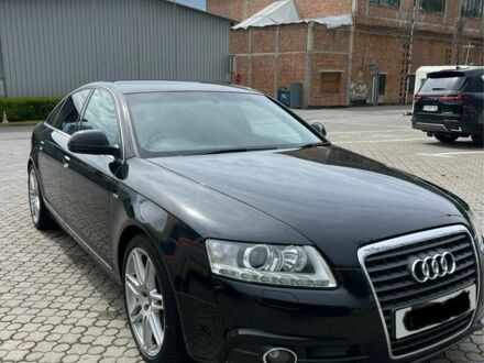 Черный Ауди А6, объемом двигателя 2 л и пробегом 300 тыс. км за 6500 $, фото 1 на Automoto.ua