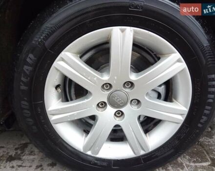 Черный Ауди А6, объемом двигателя 2 л и пробегом 265 тыс. км за 12500 $, фото 1 на Automoto.ua