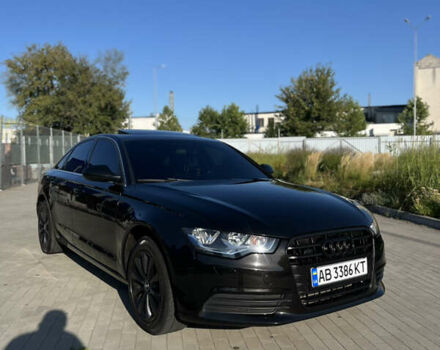 Черный Ауди А6, объемом двигателя 1.98 л и пробегом 136 тыс. км за 12200 $, фото 1 на Automoto.ua