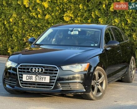 Черный Ауди А6, объемом двигателя 2 л и пробегом 285 тыс. км за 12700 $, фото 1 на Automoto.ua