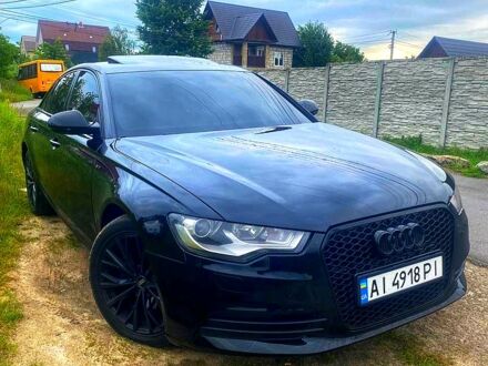 Черный Ауди А6, объемом двигателя 2 л и пробегом 275 тыс. км за 15550 $, фото 1 на Automoto.ua