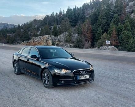 Черный Ауди А6, объемом двигателя 2 л и пробегом 265 тыс. км за 14000 $, фото 1 на Automoto.ua
