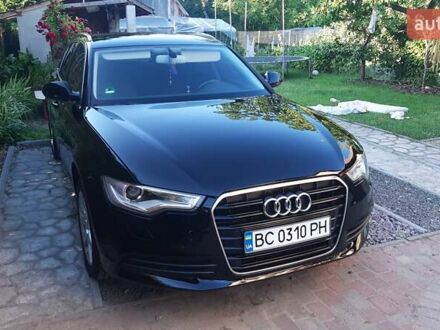 Чорний Ауді А6, об'ємом двигуна 2 л та пробігом 283 тис. км за 14599 $, фото 1 на Automoto.ua