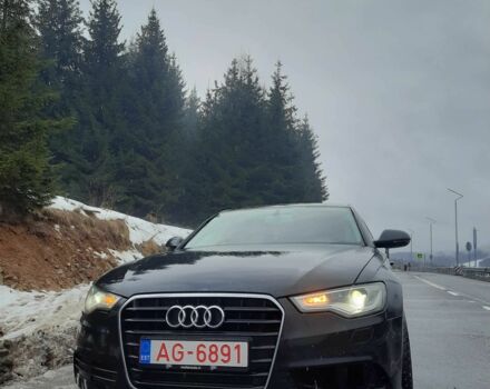 Черный Ауди А6, объемом двигателя 2 л и пробегом 222 тыс. км за 12550 $, фото 1 на Automoto.ua