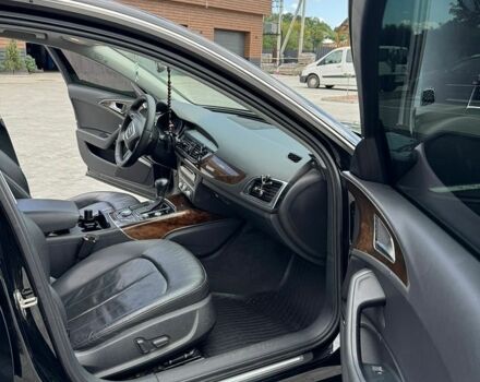Чорний Ауді А6, об'ємом двигуна 2 л та пробігом 205 тис. км за 12800 $, фото 1 на Automoto.ua