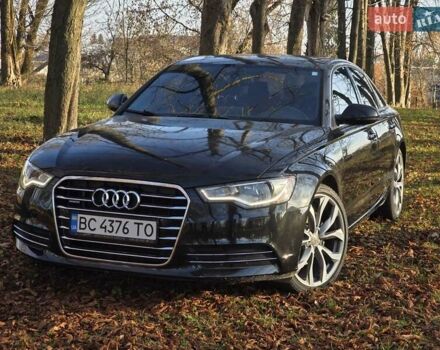Черный Ауди А6, объемом двигателя 2 л и пробегом 219 тыс. км за 12800 $, фото 1 на Automoto.ua