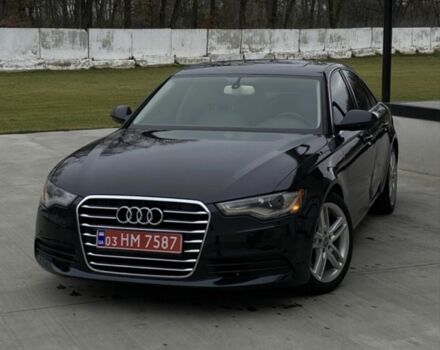 Черный Ауди А6, объемом двигателя 2 л и пробегом 300 тыс. км за 10300 $, фото 1 на Automoto.ua