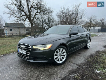Чорний Ауді А6, об'ємом двигуна 1.98 л та пробігом 248 тис. км за 12500 $, фото 1 на Automoto.ua