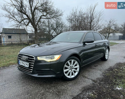 Черный Ауди А6, объемом двигателя 1.98 л и пробегом 248 тыс. км за 12500 $, фото 1 на Automoto.ua