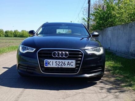 Черный Ауди А6, объемом двигателя 2 л и пробегом 305 тыс. км за 15000 $, фото 1 на Automoto.ua