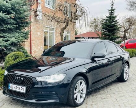 Черный Ауди А6, объемом двигателя 2 л и пробегом 250 тыс. км за 12200 $, фото 1 на Automoto.ua