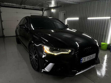 Черный Ауди А6, объемом двигателя 2 л и пробегом 168 тыс. км за 14300 $, фото 1 на Automoto.ua