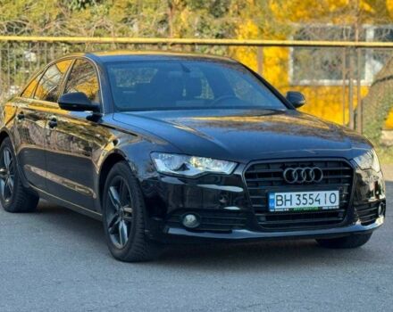 Черный Ауди А6, объемом двигателя 2 л и пробегом 230 тыс. км за 12900 $, фото 1 на Automoto.ua