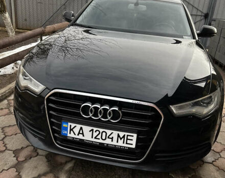 Черный Ауди А6, объемом двигателя 1.98 л и пробегом 220 тыс. км за 10900 $, фото 1 на Automoto.ua