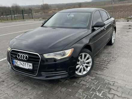 Чорний Ауді А6, об'ємом двигуна 2 л та пробігом 194 тис. км за 13700 $, фото 1 на Automoto.ua
