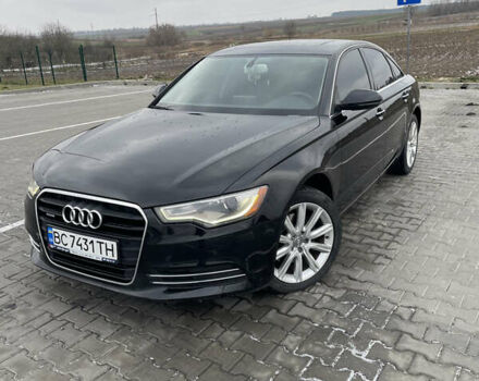 Черный Ауди А6, объемом двигателя 2 л и пробегом 194 тыс. км за 12600 $, фото 1 на Automoto.ua