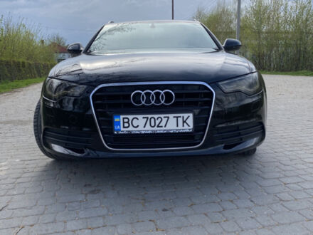 Черный Ауди А6, объемом двигателя 2 л и пробегом 260 тыс. км за 15700 $, фото 1 на Automoto.ua