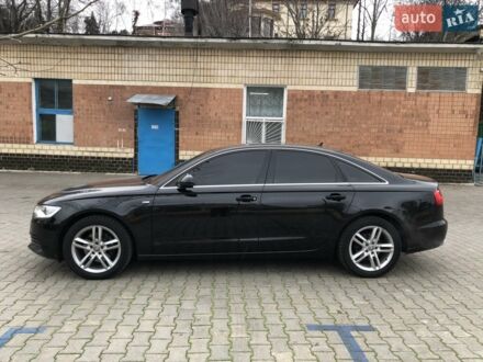 Черный Ауди А6, объемом двигателя 1.98 л и пробегом 205 тыс. км за 17600 $, фото 1 на Automoto.ua