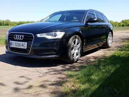 Чорний Ауді А6, об'ємом двигуна 2 л та пробігом 305 тис. км за 11900 $, фото 1 на Automoto.ua