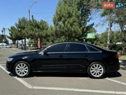 Черный Ауди А6, объемом двигателя 2 л и пробегом 267 тыс. км за 13500 $, фото 1 на Automoto.ua