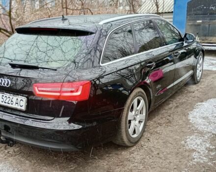 Чорний Ауді А6, об'ємом двигуна 2 л та пробігом 305 тис. км за 15000 $, фото 1 на Automoto.ua