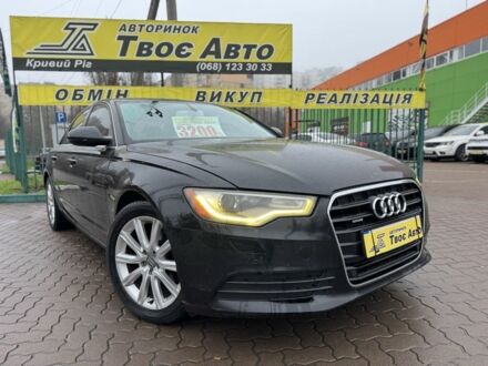 Черный Ауди А6, объемом двигателя 2 л и пробегом 174 тыс. км за 11550 $, фото 1 на Automoto.ua