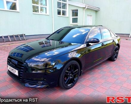 Черный Ауди А6, объемом двигателя 2 л и пробегом 220 тыс. км за 13900 $, фото 1 на Automoto.ua
