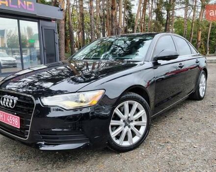 Чорний Ауді А6, об'ємом двигуна 2 л та пробігом 196 тис. км за 12699 $, фото 1 на Automoto.ua