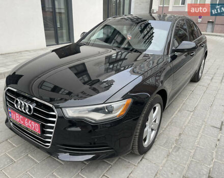 Черный Ауди А6, объемом двигателя 2 л и пробегом 299 тыс. км за 11800 $, фото 1 на Automoto.ua