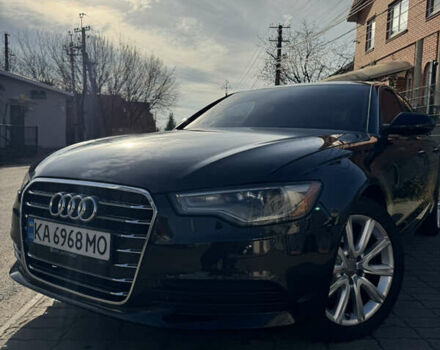 Черный Ауди А6, объемом двигателя 1.98 л и пробегом 189 тыс. км за 10800 $, фото 1 на Automoto.ua