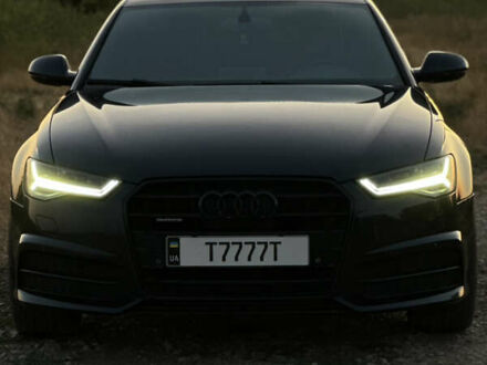 Черный Ауди А6, объемом двигателя 2 л и пробегом 310 тыс. км за 16000 $, фото 1 на Automoto.ua